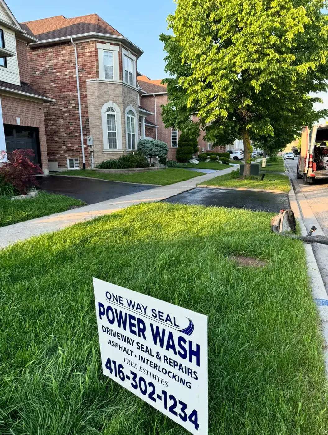 Detailed custom asphalt work along a curb