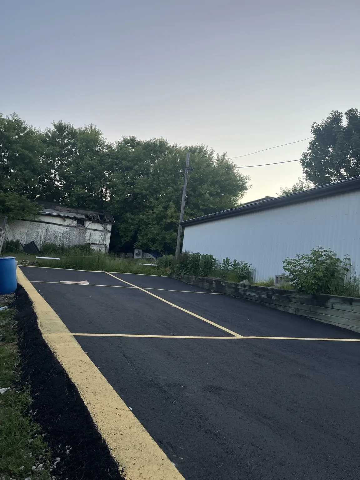 Organized commercial parking lot layout with fresh yellow lines
