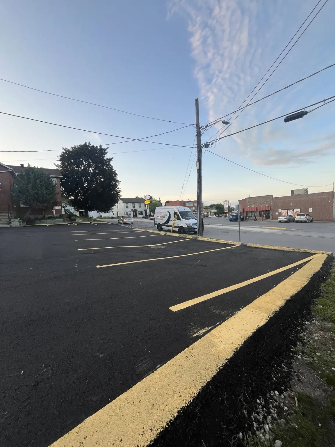 Commercial parking lot with freshly painted yellow parking lines